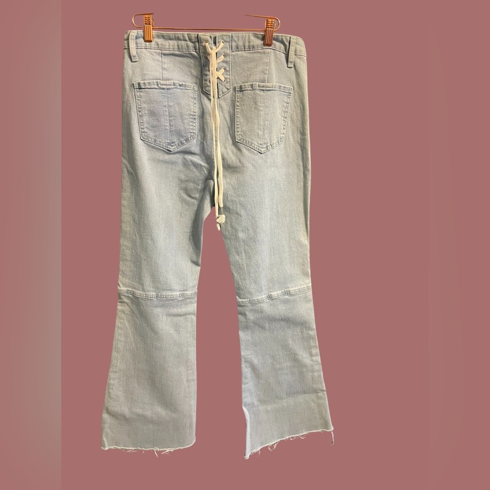 Flared jeans with lace up back